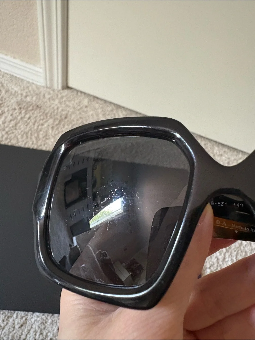Prada Black Frame Sunglasses with Tortoiseshell Temples